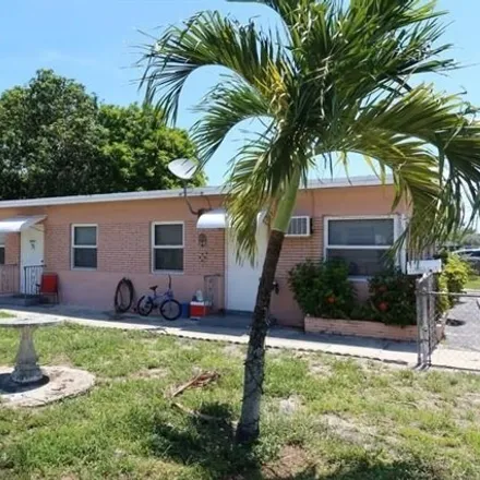 Buy this 3 bed house on 205 SE 10th St in Hallandale Beach, Florida