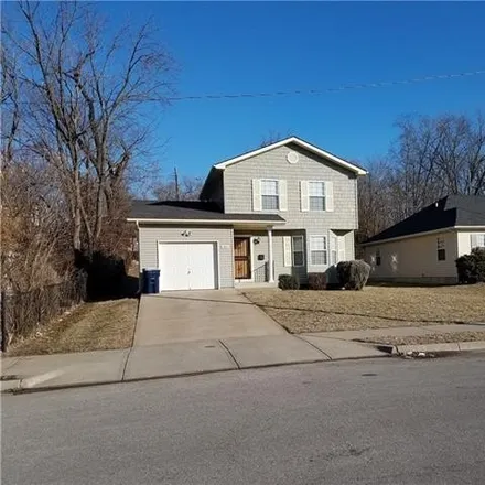 Buy this 4 bed house on 3909-3911 Highland Avenue in Kansas City, MO 64110