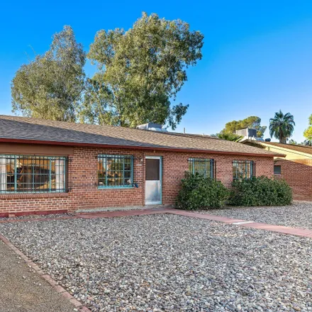 Buy this 4 bed house on 4882 East Scarlett Street in Tucson, AZ 85711