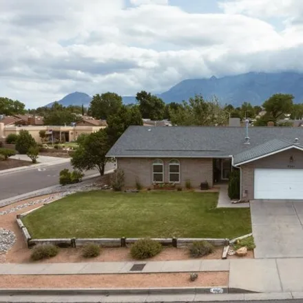 Buy this 3 bed house on 9301 Farragut Dr NE in Albuquerque, New Mexico