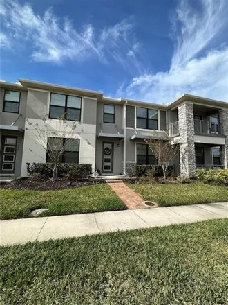 Buy this 3 bed townhouse on unnamed road in Kissimmee, FL 34741