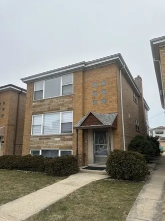 Rent this 2 bed house on 5511 North Mango Avenue in Chicago, IL 60646
