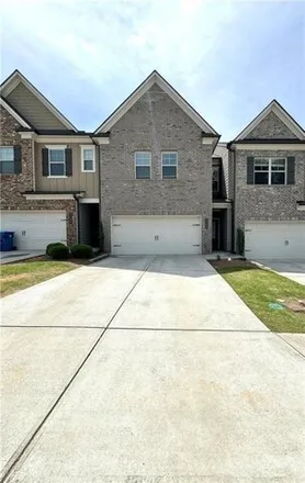 Rent this 3 bed townhouse on Irwell Way in Sweet Water, GA 30044