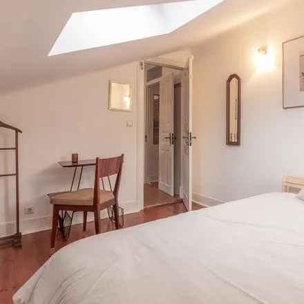 Rent this 4 bed room on Rua Carvalho Araújo 33 in 1900-140 Lisbon, Portugal
