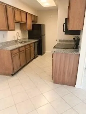 Rent this 2 bed townhouse on 401 Gatewood Road in Garland, TX 75043