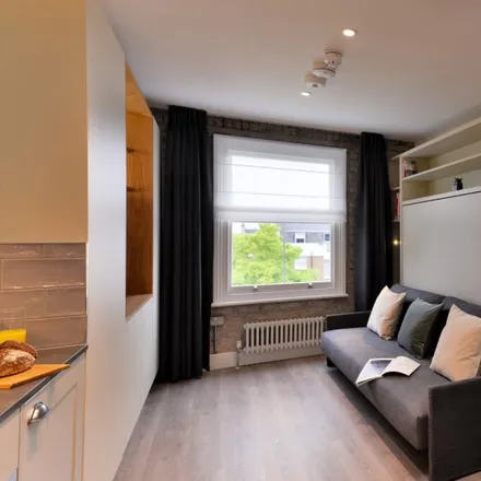 Image 1 - Andrew Provan House, 8-9 Pembridge Square, London, W2 4ED, United Kingdom - Apartment for rent