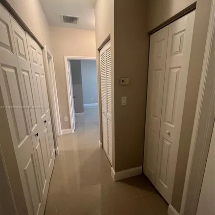 Rent this 4 bed apartment on 14344 Southwest 11th Street in Pembroke Pines, FL 33027