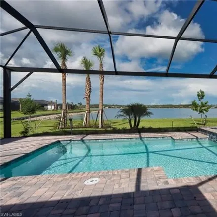 Rent this 3 bed house on Blue Bay Circle in Lee County, FL
