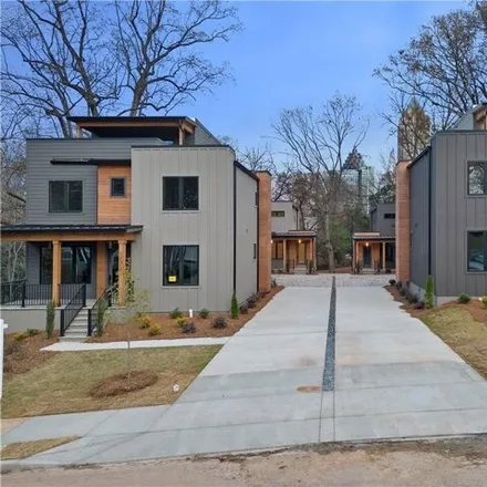 Rent this 5 bed townhouse on Atlantic Station in 1231 Holly Street Northwest, Atlanta