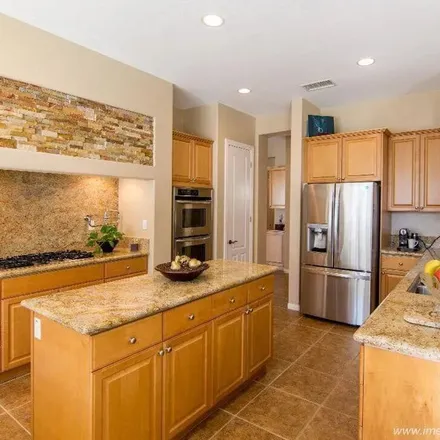 Rent this 4 bed apartment on 113 Tesoni Drive in Palm Desert, CA 92211