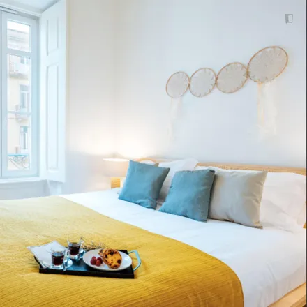 Rent this 3 bed apartment on Rua Álvaro Coutinho in 1150-010 Lisbon, Portugal
