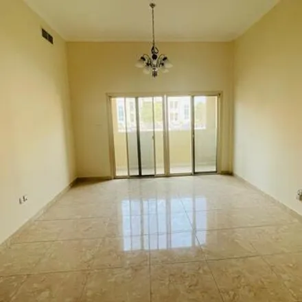 Rent this 2 bed townhouse on unnamed road in Dubai Investments Park, Dubai