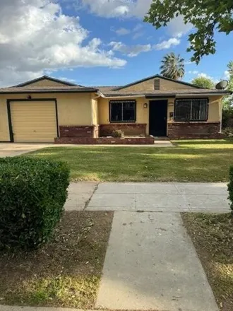 Buy this 4 bed house on Fung's Chinese Kitchen in East Butler Avenue, Fresno