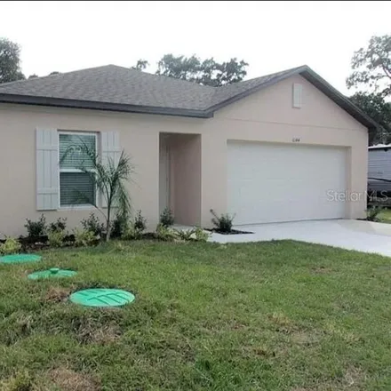 Rent this 4 bed house on 6140 Piedmont Drive in Spring Hill, FL 34606