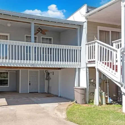 Rent this 2 bed house on 45 Tiki Circle in Tiki Island, Galveston County