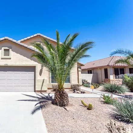 Buy this 4 bed house on 43952 W Windrose Dr in Maricopa, Arizona