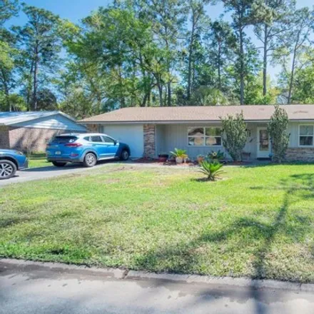 Buy this 3 bed house on 1675 Southwest Caroline Court in Lake City, FL 32025