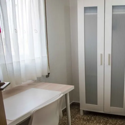 Rent this 3 bed room on Carrer del Capitular de Gandia in 46017 Valencia, Spain