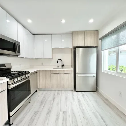 Rent this 3 bed apartment on 2052 South Garth Avenue in Los Angeles, CA 90034