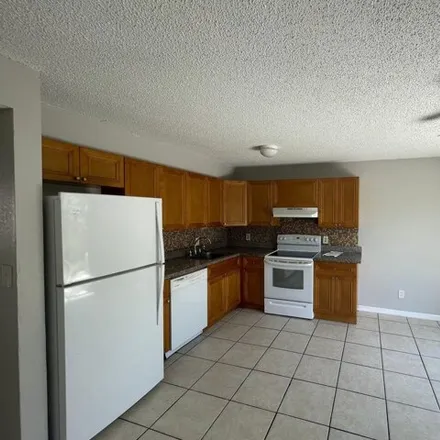 Rent this 3 bed house on 3483 Coral Springs Drive in Kensington Manor, Coral Springs