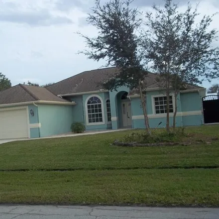 Buy this 4 bed house on 2483 Southwest Falcon Circle in Port Saint Lucie, FL 34953