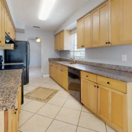 Buy this 3 bed apartment on 351 Northwest 39Th Street