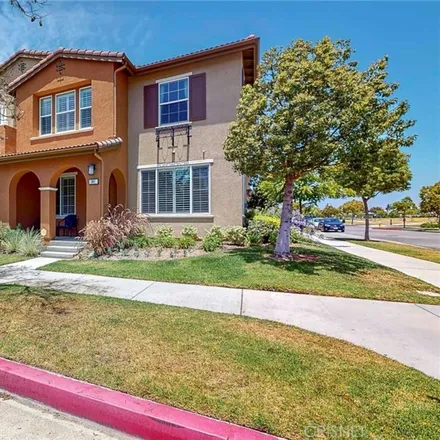 Buy this 4 bed townhouse on 341 American River Court in El Rio, Oxnard