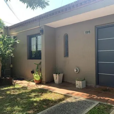 Buy this 3 bed house on Pio Collivadino in Partido de Ituzaingó, B1712 CDU Ituzaingó