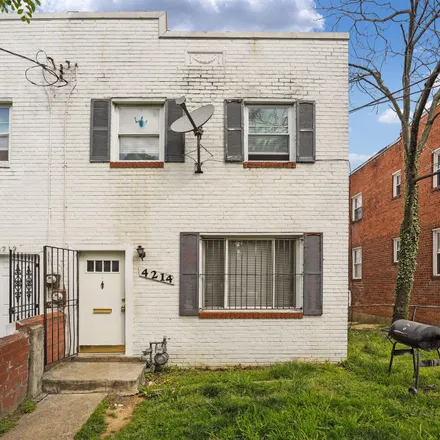 Buy this 4 bed townhouse on 4202 Edson Place Northeast in Washington, DC 20019