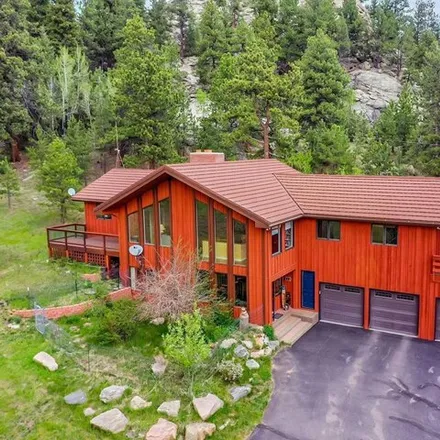 Buy this 4 bed house on 32601 Buffalo Park Rd in Evergreen, Colorado