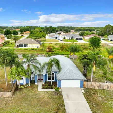 Buy this 4 bed house on 1517 Rachel Avenue Southeast in Palm Bay, FL 32909