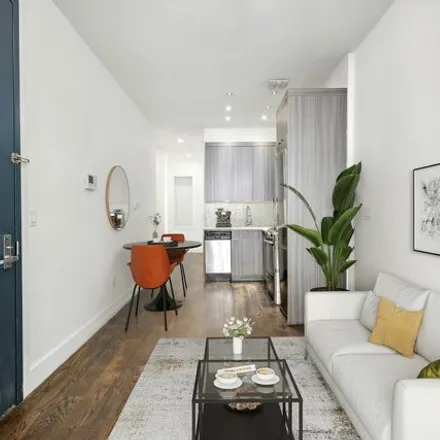 Rent this 4 bed condo on 580 Fairview Avenue in New York, NY 11385