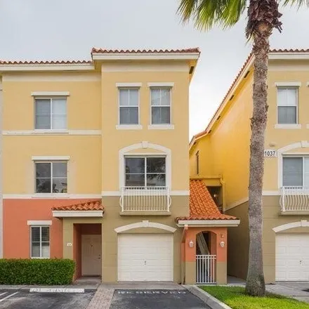 Buy this 2 bed condo on Legacy Boulevard in Monet, Palm Beach Gardens