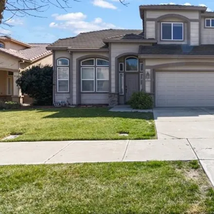 Buy this 4 bed house on 3066 Red Oak Court in Turlock, CA 95382