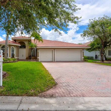 Buy this 5 bed house on 5037 Northwest 123rd Avenue in Coral Springs, FL 33076