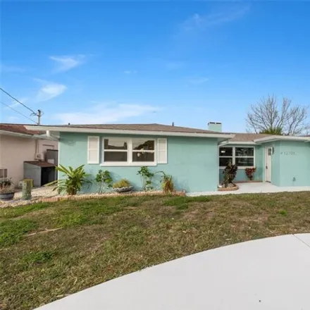 Buy this 4 bed house on 12705 4th Isle in Hudson, FL 34667