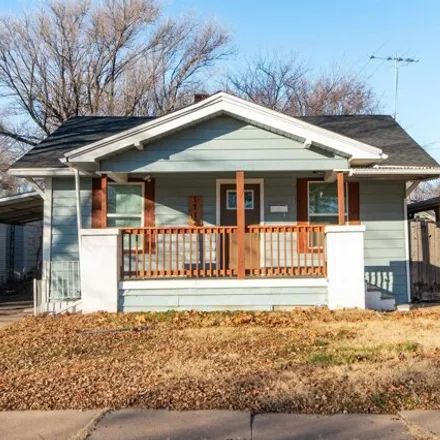 Buy this 3 bed house on 1731 South Market Street in Wichita, KS 67211