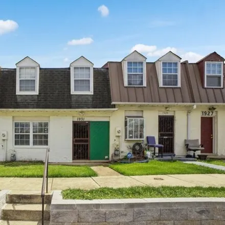 Buy this 3 bed townhouse on 1931 Village Green Dr Unit U203 in Hyattsville, Maryland