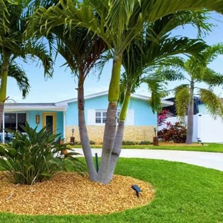 Buy this 3 bed house on 470 Ocean Spray Avenue in Satellite Beach, FL 32937