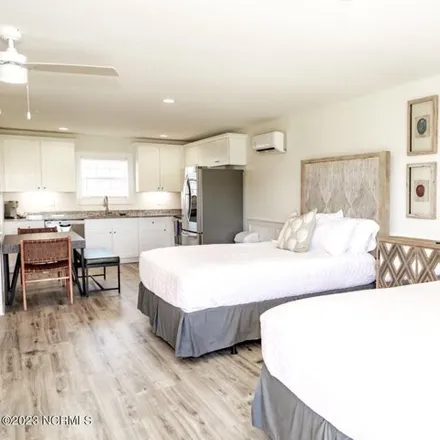 Image 2 - SaltWater Suites, 605 North Topsail Drive, Surf City, NC 28445, USA - House for rent