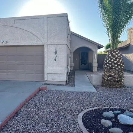 Rent this 3 bed house on 1634 North Comanche Drive in Chandler, AZ 85224