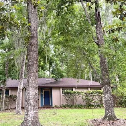 Buy this 4 bed house on 10505 Northwest 25th Place in Alachua County, FL 32606