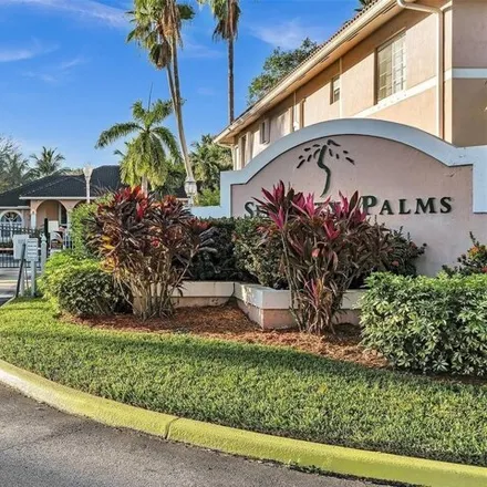 Buy this 2 bed condo on 3226 Sabal Palm Manor in Davie, FL 33024