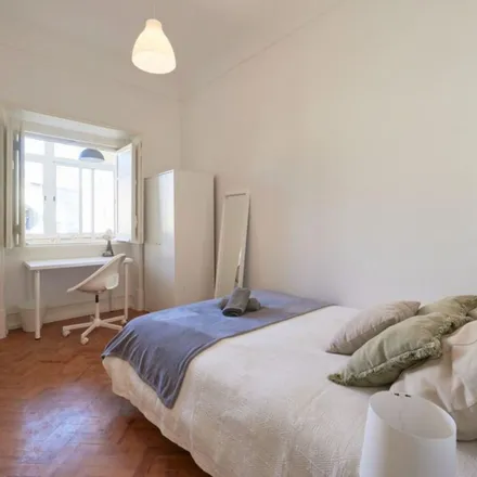 Rent this 12 bed apartment on Avenida Almirante Reis 219 in 1000-049 Lisbon, Portugal