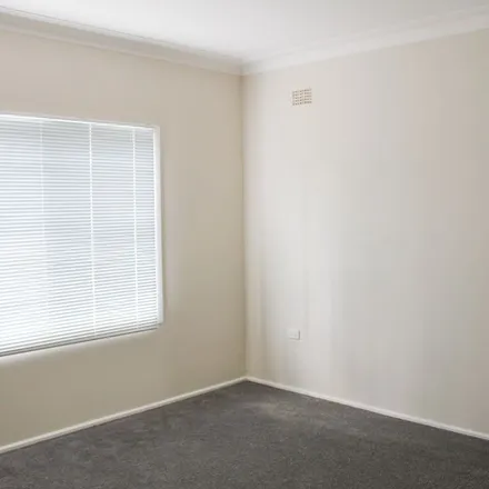 Rent this 2 bed apartment on Weringa Avenue in Lake Heights NSW 2502, Australia