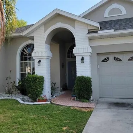 Buy this 5 bed house on 9090 Water Hazard Drive in Hudson, FL 34667