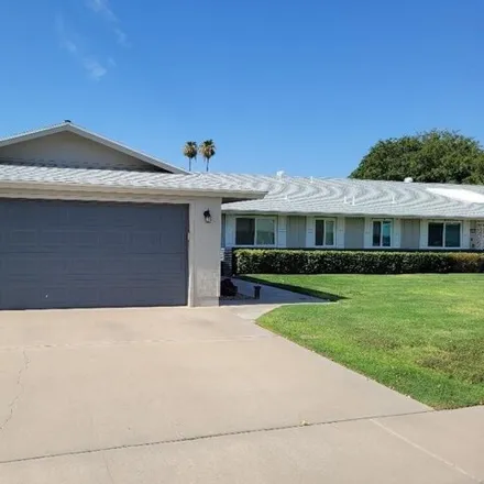 Rent this 3 bed house on 10348 West Kingswood Circle in Sun City, AZ 85351