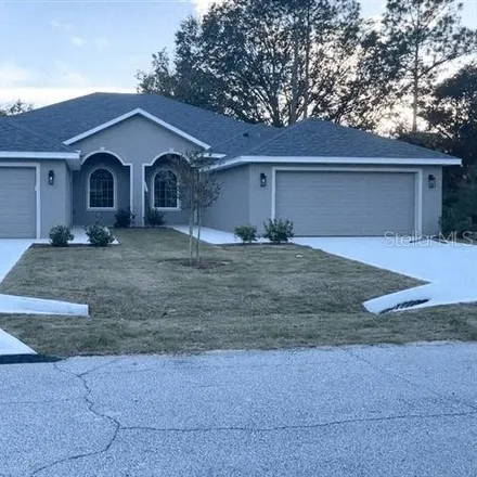 Buy this 3 bed duplex on 56 Providence Lane in Palm Coast, FL 32164