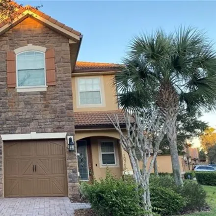 Rent this 4 bed house on 10772 Belfry Circle in Orange County, FL 32832