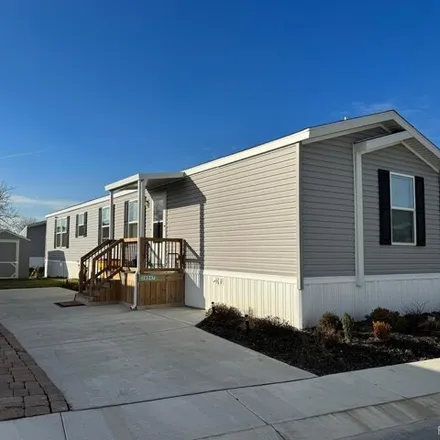 Buy this studio apartment on 38075 Leverette Avenue in Clinton Charter Township, MI 48038